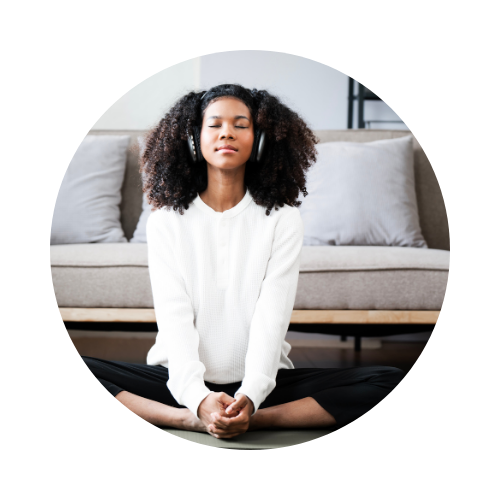 Woman meditating in a white sweater representing spiritual healing at Eclectic Lyfe LLC Woman meditating in a white sweater representing spiritual healing at Eclectic Lyfe LLC