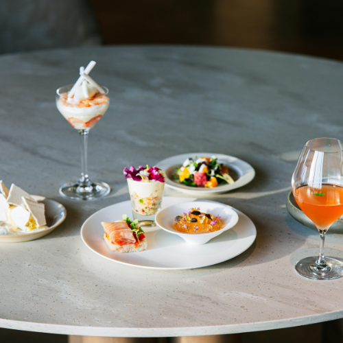 An elegant elemental dining setup with small plates and refreshments at the Elements of the Soul Retreat by Eclectic Lyfe LLC